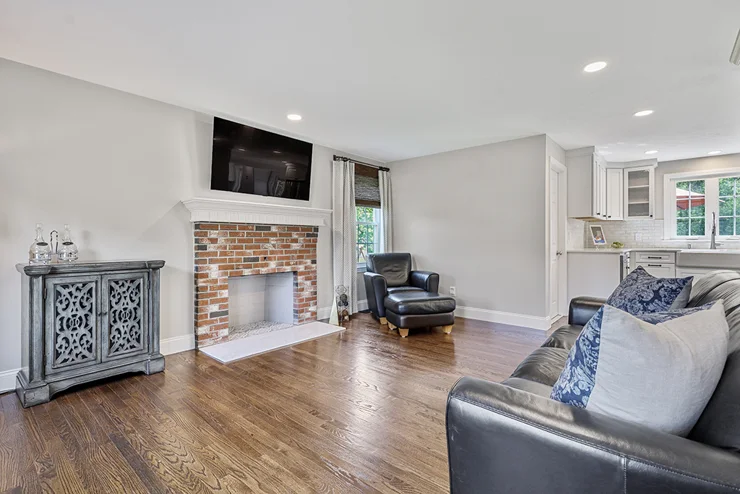 Remodeled living room with fireplace